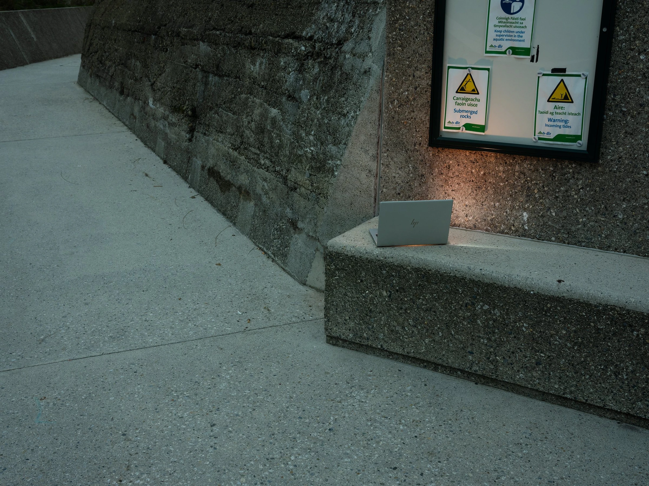 A recessed stone ledge and a framed display